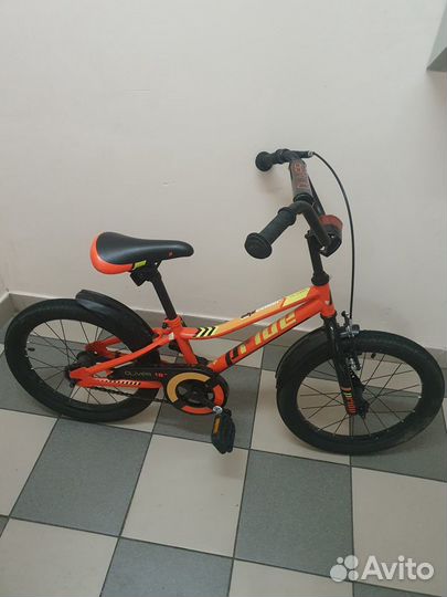 Велосипед детский оранжевого цвета