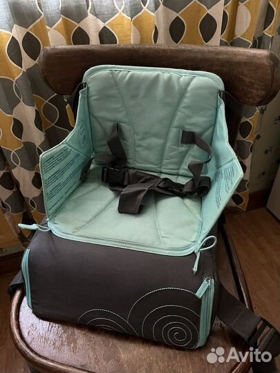 Переносной стульчик для кормления munchkin