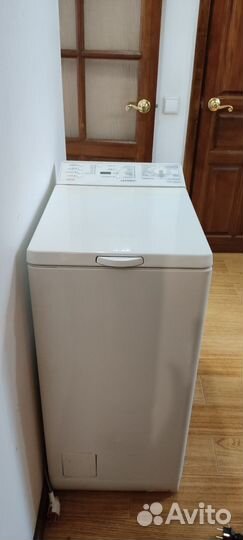 Стиральная машина с вертикальной загрузкой