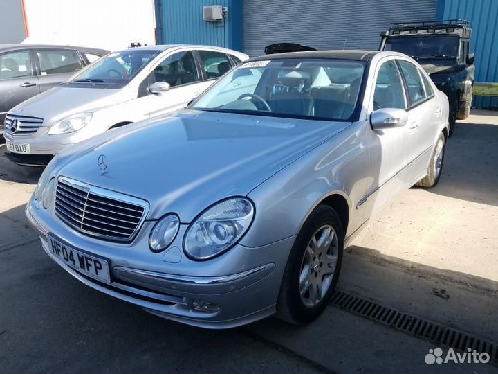 Кулак поворотный задний левый Mercedes E W211 3.2