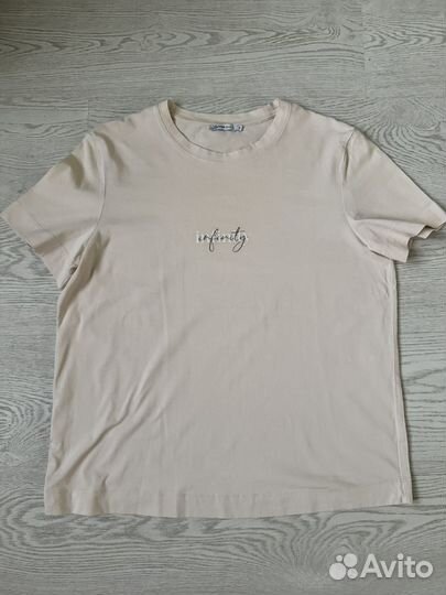 Футболки женские