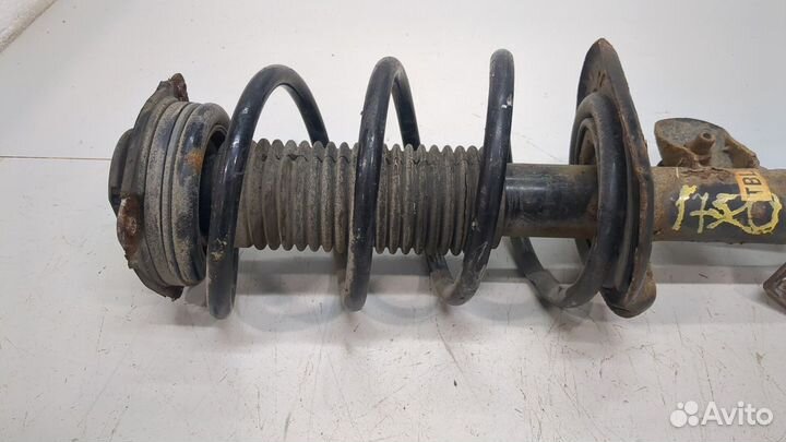 Амортизатор подвески левый передний Nissan Juke