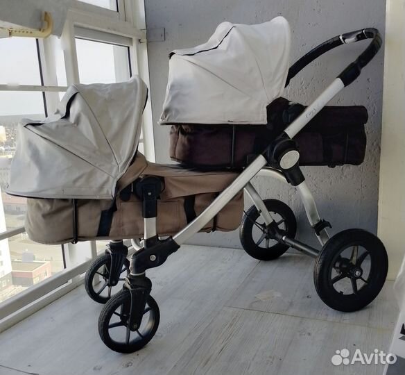 Коляска для двойни baby jogger city select