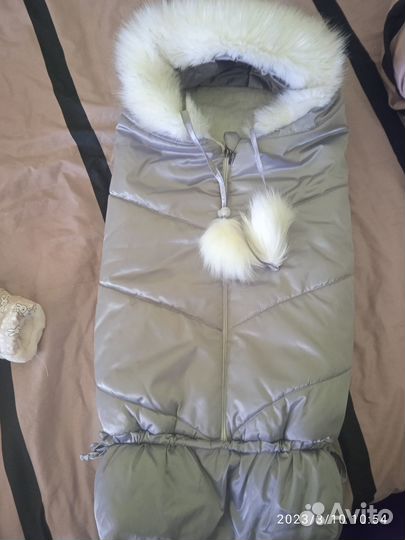 Конверт и комбинезон новорожденного