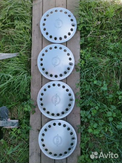 Комплект оригинальных колпаков Opel 1987 года