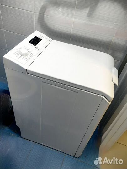 Стиральная машина с вертикальной загрузкой