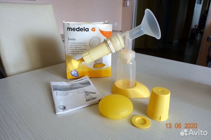 Молокоотсос ручной поршневой Medela