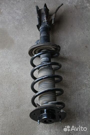 Opel Antara стойка передняя левая