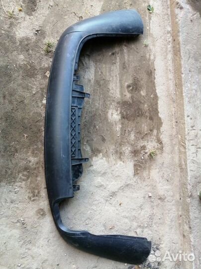 Спойлер (юбка) бампера задний Volkswagen Passat B6