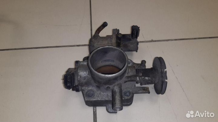 Заслонка дроссельная Mazda 323