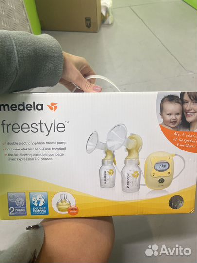 Молокоотсос двойной medela freestyle double новый