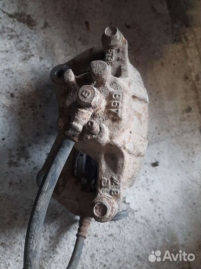 Суппорт передний Mitsubishi Lancer 10