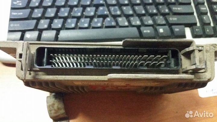 Блок управления двигателем Kangoo 1,4 E7J