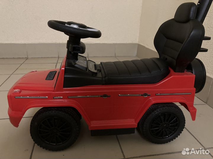 Машина каталка с ручкой