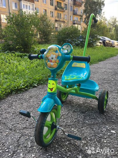 Трехколесный велосипед с ручкой