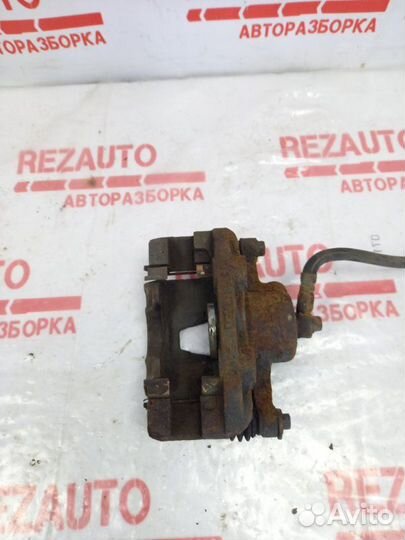 Суппорт тормозной передний левый Chevrolet Lanos