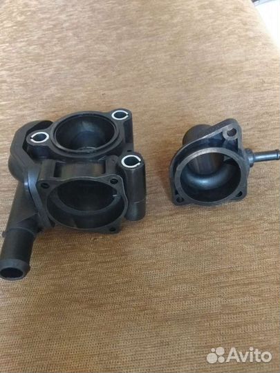 Корпус термостата на Форд фокус 1