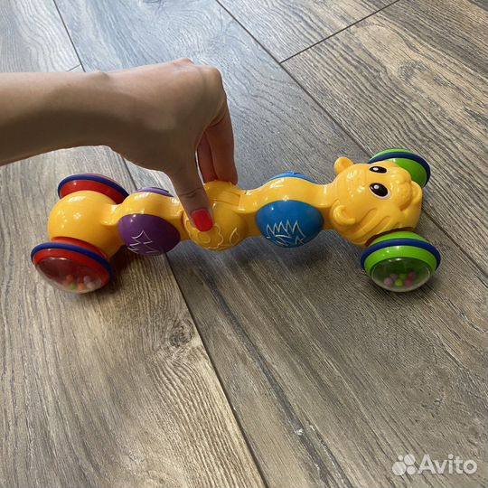 Игрушка каталка