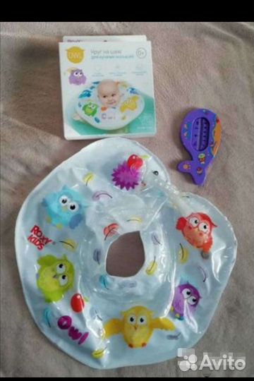Круг для купания и термометр
