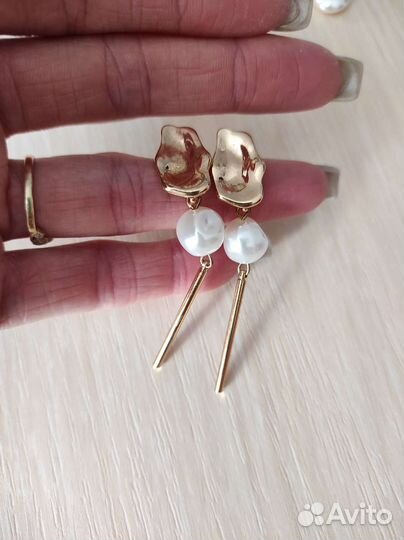 Новые серьги разные