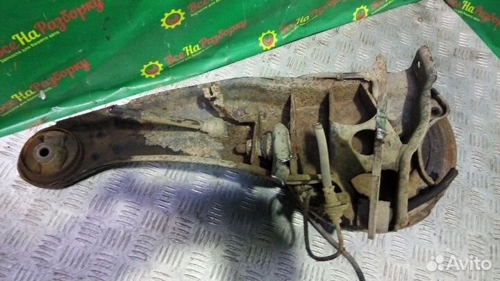 Кулак задний левый Mitsubishi Lancer 9 универсал