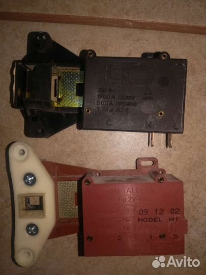 Устройство блокировки люка от стиральной машины