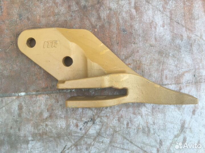 Зуб боковой левый E25 53103209