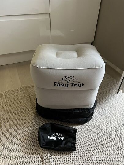 Надувная подушка для ног в самолет