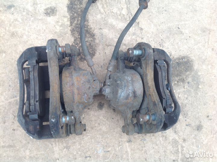 Суппорт передний правый левый Киа Рио 2