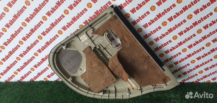 Обшивка боковой двери задняя левая Nissan Tiida