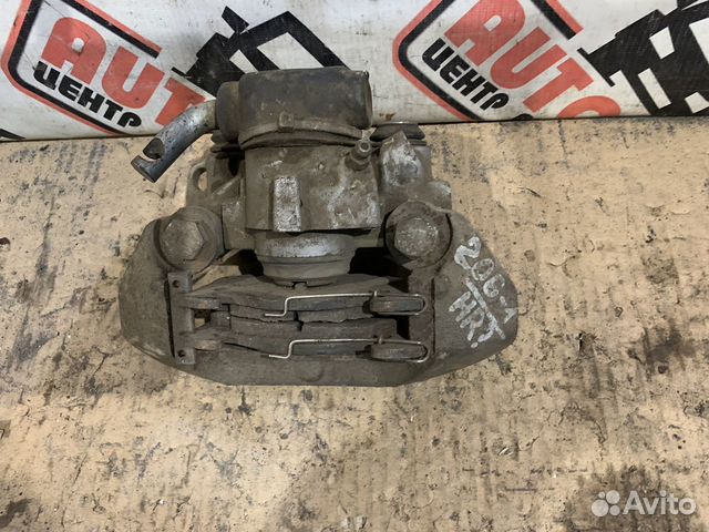 Суппорт задний левый правый Peugeot 206