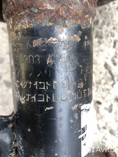 Амортизатор пружина передний левый Nissan Primera