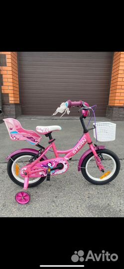 Детский четырёхколёсный велосипед