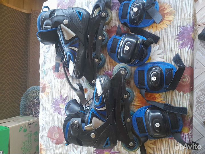 Роликовые коньки