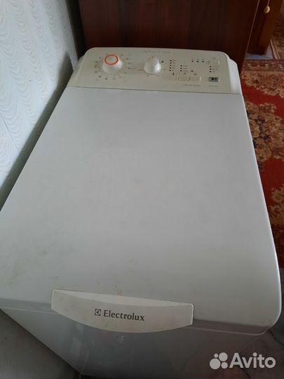 Стиральная машина с вертикальной загрузкой