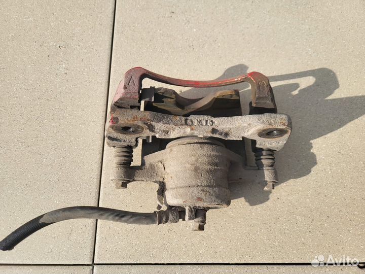 Тормозной суппорт передний правый Chevrolet Лачетт