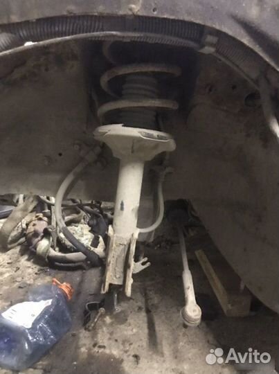 Стойки передние Nissan Almera N15