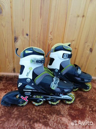 Роликовые коньки