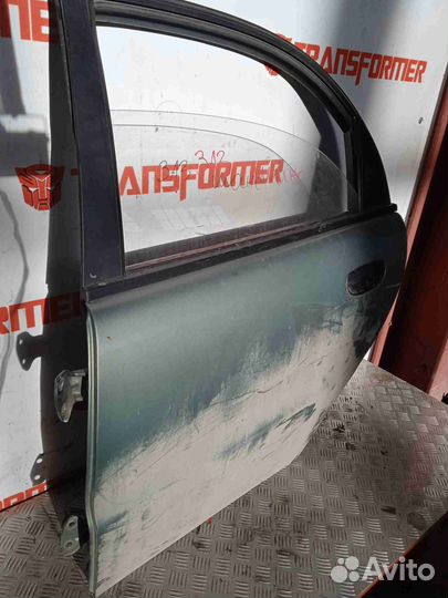 Стекло двери заднее левое Заз Шанс