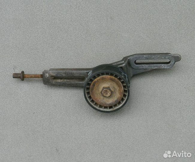 Натяжитель ремня генератора Berlingo