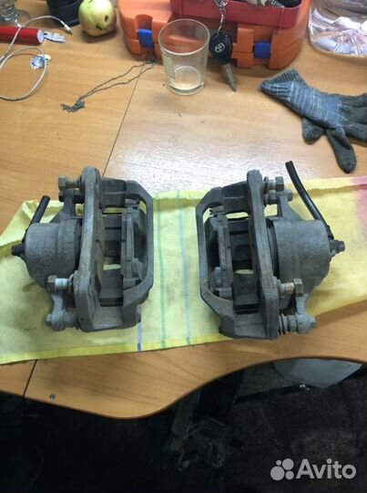 Суппорт передний левый Kia Cerato 2