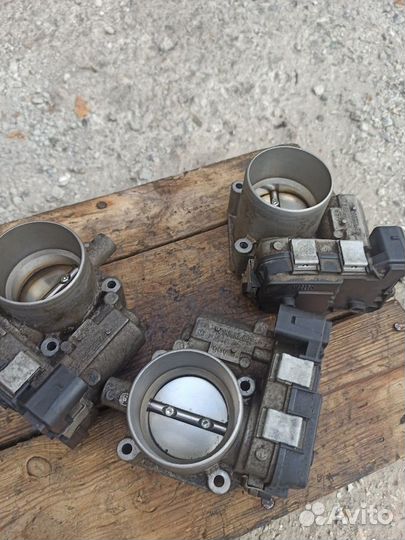 Заслонка дроссельная электрическая Шкода Карог