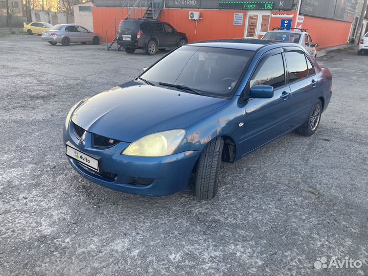 Mitsubishi Lancer 1.6 МТ, 2003, 100 000 км