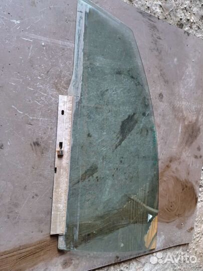 Стекло двери передний левый Opel Vectra C