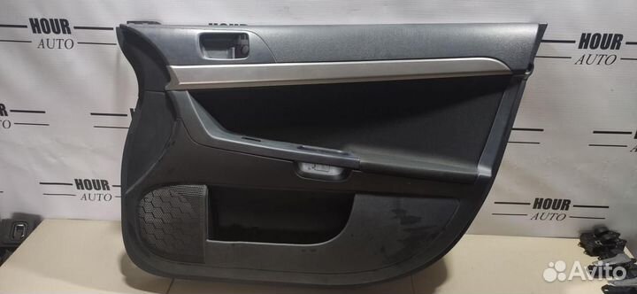 Обшивка двери передней правой Mitsubishi Lancer 10