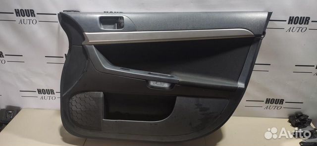 Обшивка двери передней правой Mitsubishi Lancer 10