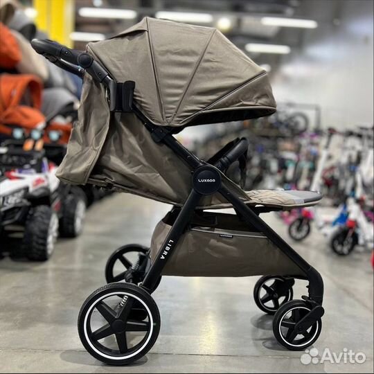 Коляска для новорождённых Luxmom