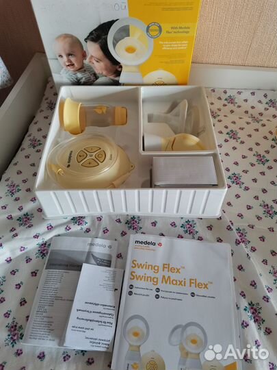 Молокоотсос medela swing flex электрический