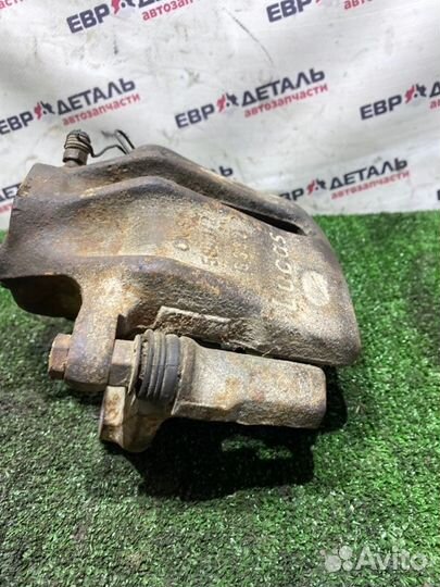 Суппорт тормозной передний правый Volkswagen