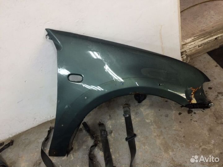 Mitsubishi l200 крыло переднее правое